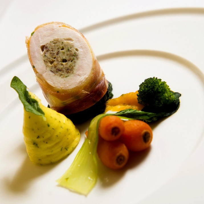 A flavour sensation - this free range chicken and haggis roulade is served with herb mash and seasonal vegetables.