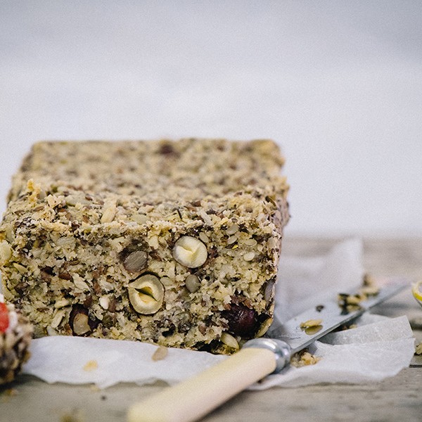 This close up view of this tasty bread shows all the healthy oats and seeds that make this gluten free, healthy alternative to bread packed with health benefits.