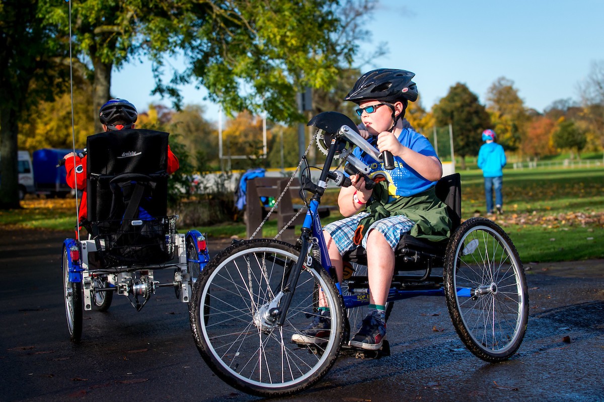 Live Active Leisure - All Ability Cycling young boy in blue