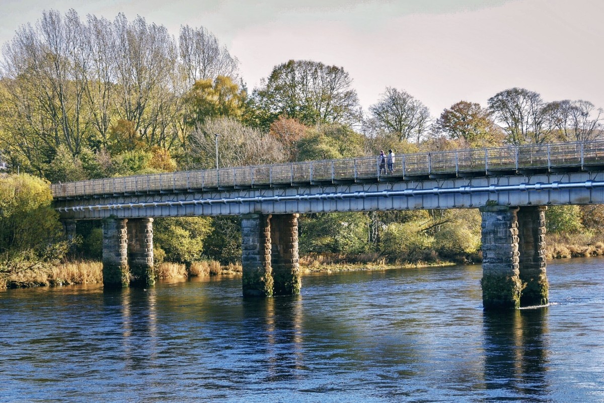 A look at the beautiful Perth Railway bridge from Tay Stree. The bridge is balanced above the flowing banks of the River Tay