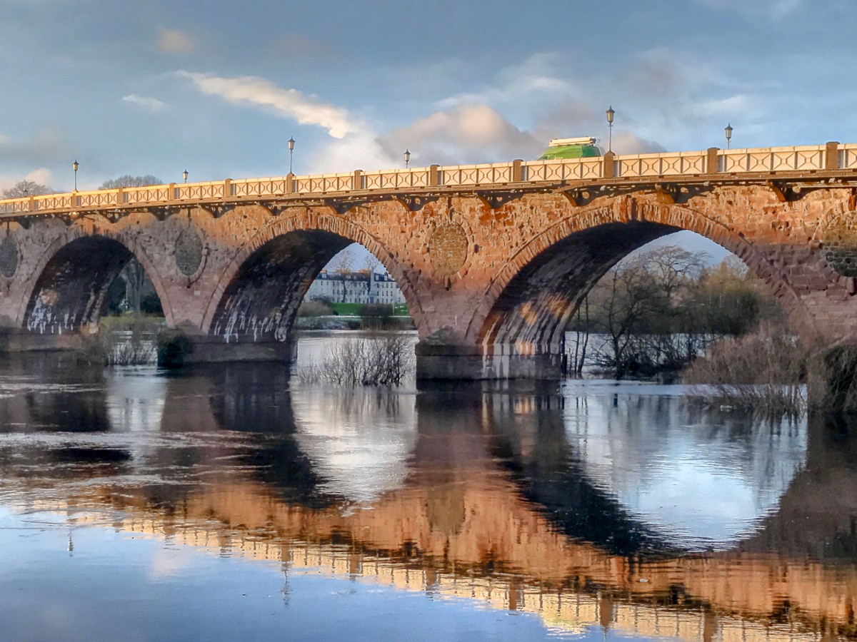 A winter view of Smeatons Bridge taken from Bridgend. The River Tay looks so serene and mysterious as the bridge is reflected into the water. A gorgeous place to take a walk and have some time to yousefl