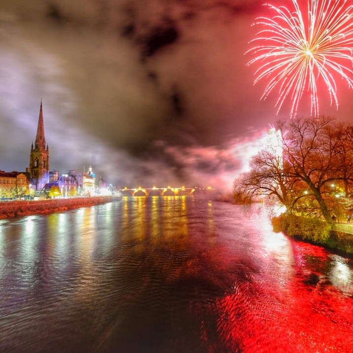 The River Tay lit up reflecting the bright Christmas colours of the city from the outstanding fireworks display which closed the Perth Christmas lights switch on party