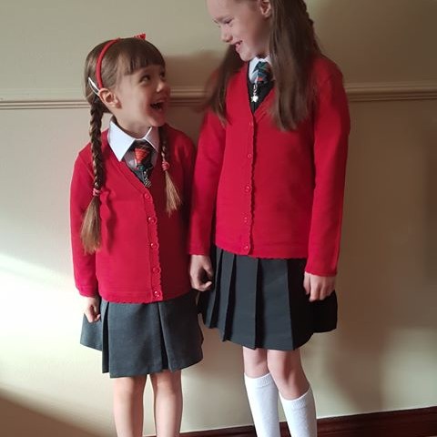 Lucy and big sis, Chloe are ready for school!
