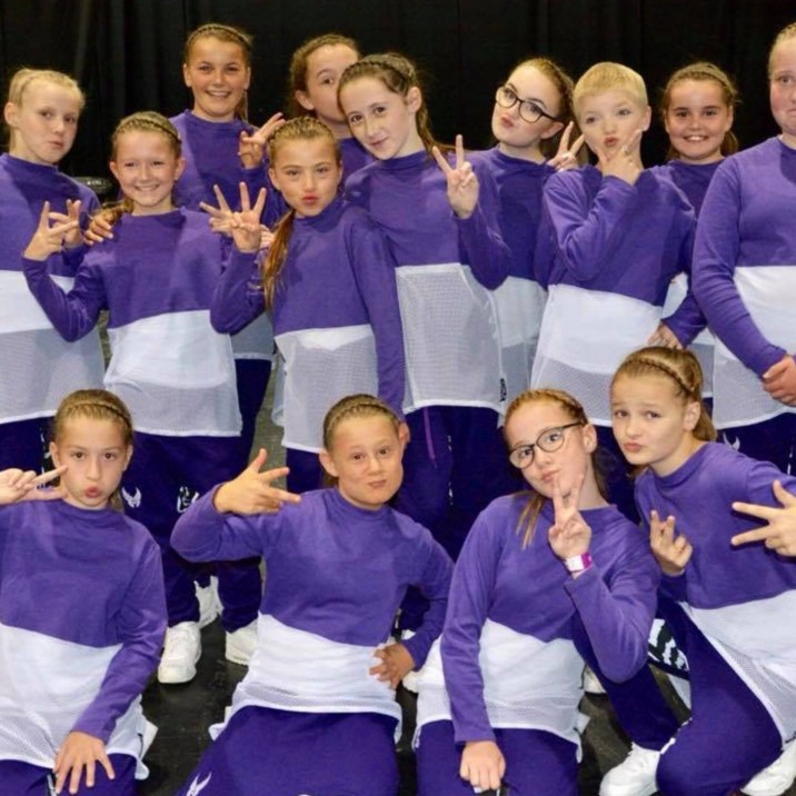 No Filter' from JGN Dance Studio in Perth City Centre huddled in their group and striking a pose after placing 7th in the world at the 2018 UDO World Championships!