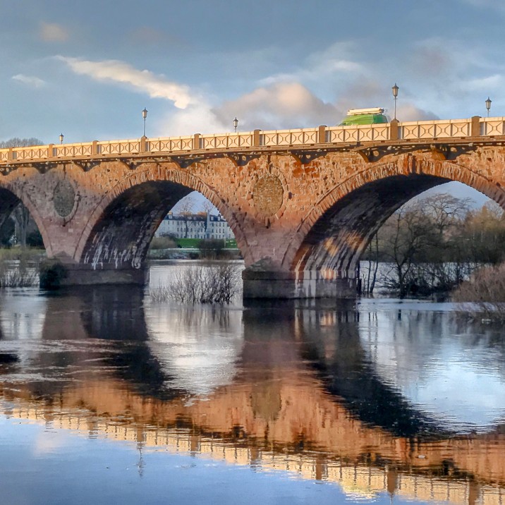 A winter view of Smeatons Bridge taken from Bridgend. The River Tay looks so serene and mysterious as the bridge is reflected into the water. A gorgeous place to take a walk and have some time to yousefl