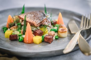 Delicious Pan Fried Sea Bass with Lemon and Mustard Dressing Recipe from Masterchef Theodore Chana. Follow this easy recipe and cook sea bass like a chef with fondant potatoes, cauliflower puree and a lemon and mustard dressing.